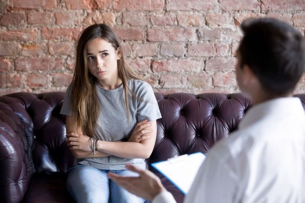 teen substance abuse in pa young girl talking with her therapist as she struggles with teen substance abuse in PA